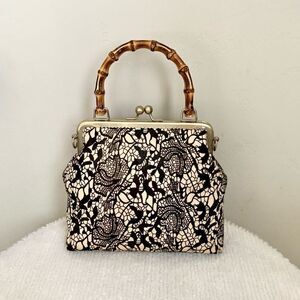 Handmade Real hair-on-horsehide Black Lace Printed Metal Frame Bamboo Handle Bag